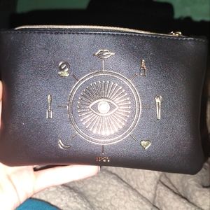 Black and gold makeup bag